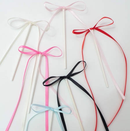 Noeuds d&eacute;coratifs pour g&acirc;teau rose x8